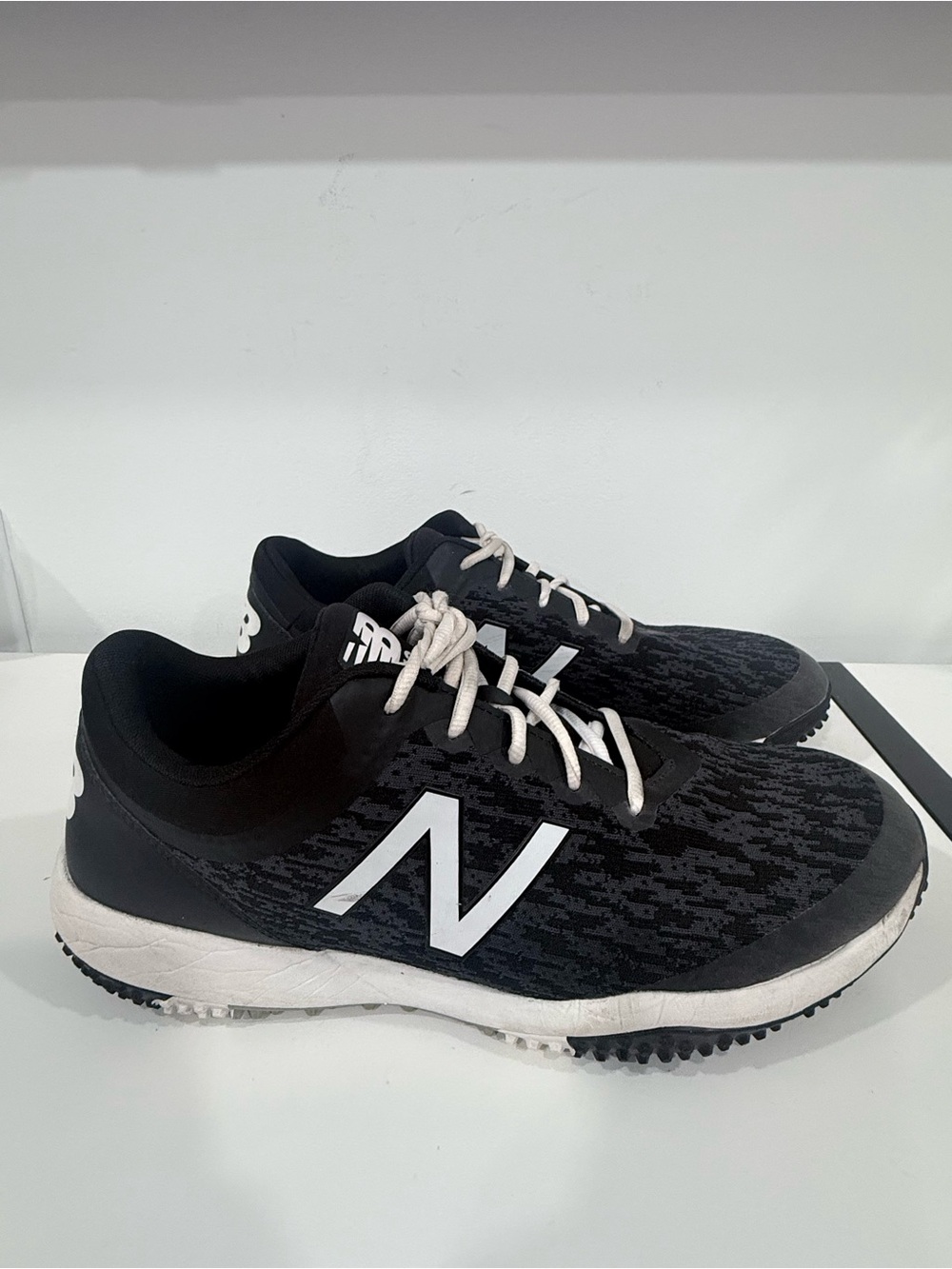 New Balance Men’s Black and White Athletic Sneakers